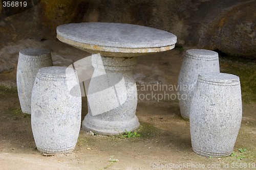 Image of Stone Table and Chairs