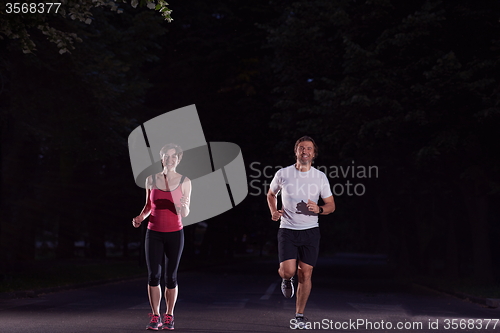 Image of couple jogging at early morning