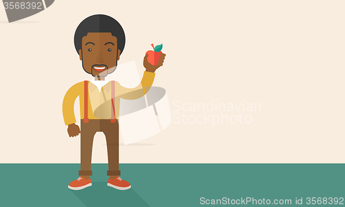 Image of Man holding apple.