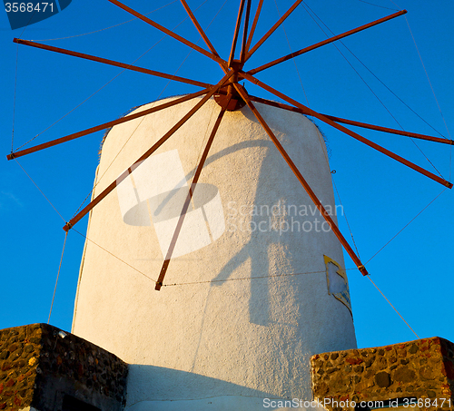 Image of old mill in santorini greece europe  and the sky sunrise