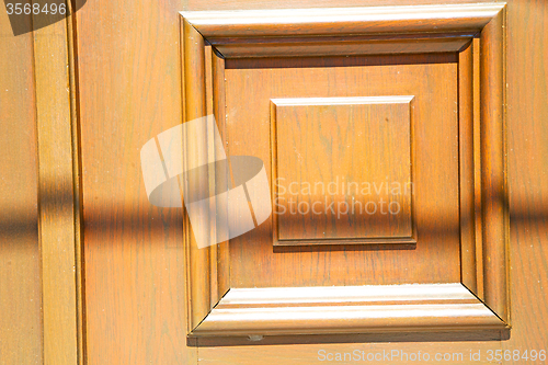 Image of texture of a brown   door in europe