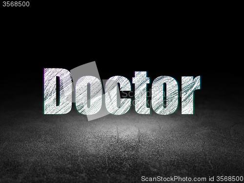 Image of Healthcare concept: Doctor in grunge dark room