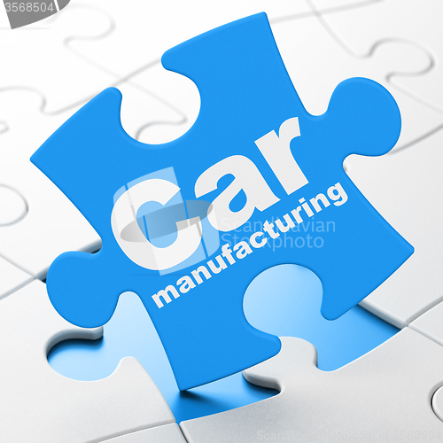 Image of Industry concept: Car Manufacturing on puzzle background