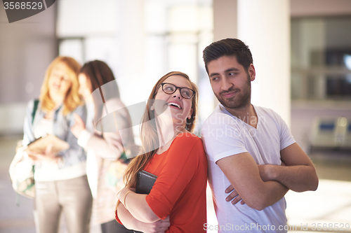 Image of students couple standing together