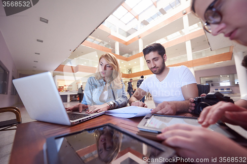 Image of students group working on school  project  together