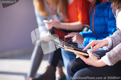 Image of students group working on school  project  together