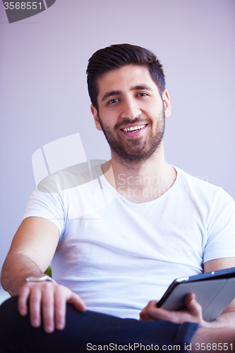 Image of student working on tablet