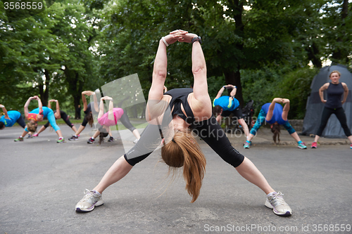 Image of jogging people group stretching