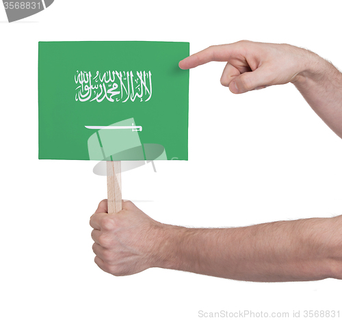 Image of Hand holding small card - Flag of Saudi Arabia