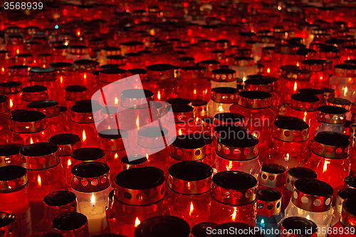 Image of Candles Burning At a Cemetery