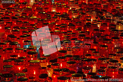 Image of Candles Burning At a Cemetery