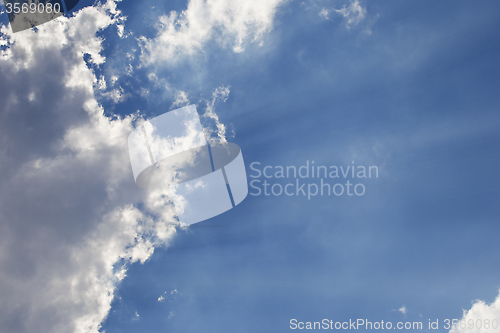 Image of Sun rays through a cloud