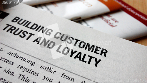 Image of Buiding customer trust and loyalty word on a book