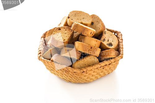 Image of Rusks with raisins in a wicker basket.