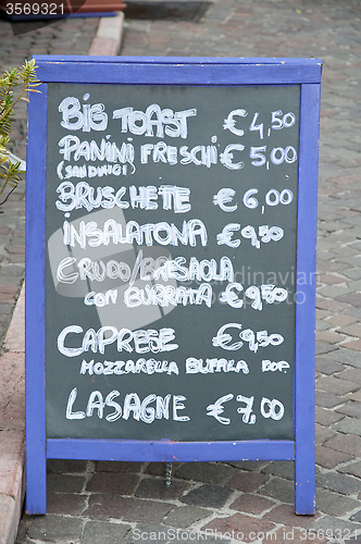 Image of Menu of a restaurant on the beach where there is' wrote: "Brusch