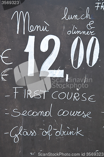 Image of A restaurant menu that indicates lunch at a fixed price of twelv