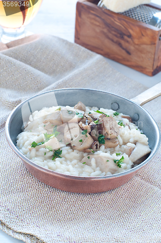 Image of 
Pasta and rice with porcini mushrooms served with butter and pa