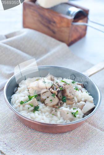 Image of 
Pasta and rice with porcini mushrooms served with butter and pa