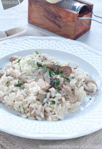 Image of 
Pasta and rice with porcini mushrooms served with butter and pa