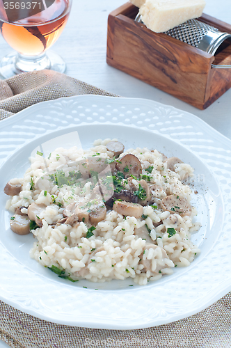 Image of 
Pasta and rice with porcini mushrooms served with butter and pa