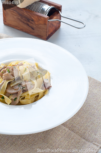 Image of 
Pasta and rice with porcini mushrooms served with butter and pa