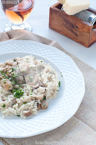 Image of 
Pasta and rice with porcini mushrooms served with butter and pa