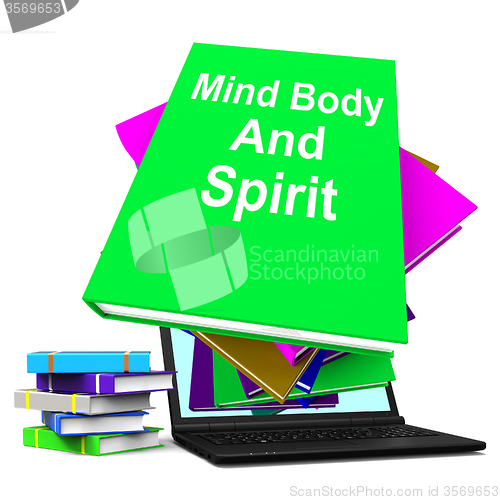 Image of Mind Body And Spirit Book Stack Laptop Shows Holistic Books