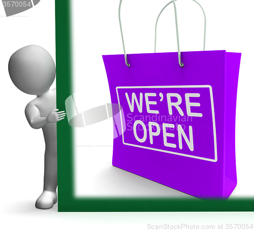 Image of We\'re Open Shopping Bag Sign Shows New Store Launch