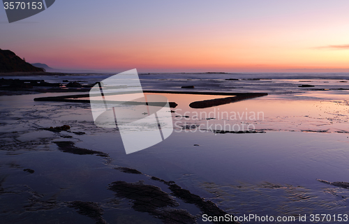 Image of The Wading Pool on the rockshelf at sunrise