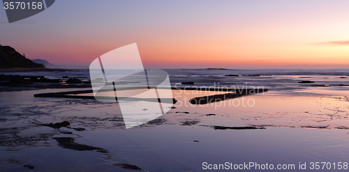 Image of The Wading Pool on the rockshelf at sunrise