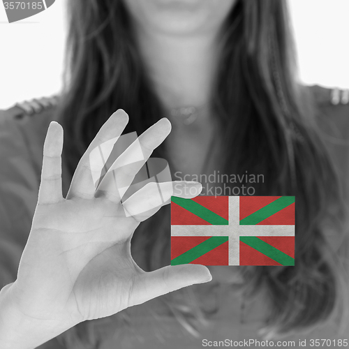 Image of Woman showing a blank business card