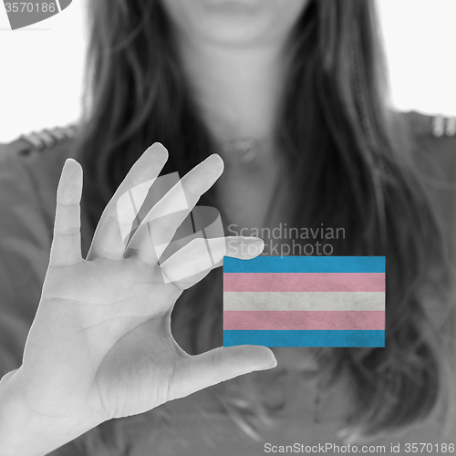 Image of Woman showing a blank business card