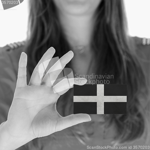Image of Woman showing a blank business card