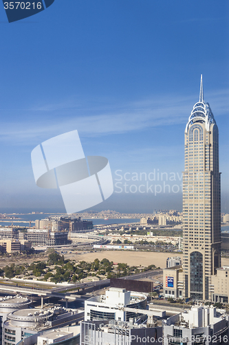 Image of Downtown Dubai. Skyscrapers and road