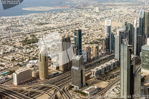 Image of Downtown Dubai. Skyscrapers and road