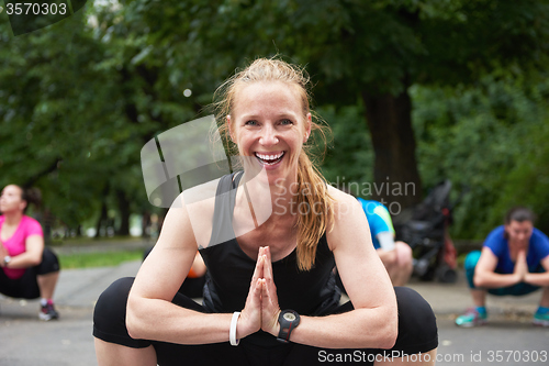 Image of jogging people group stretching