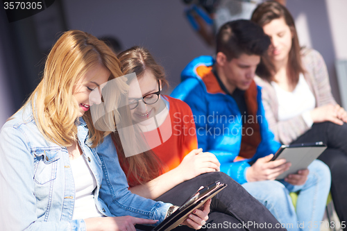 Image of students group working on school  project  together