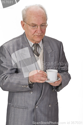 Image of Senior man with tea cup