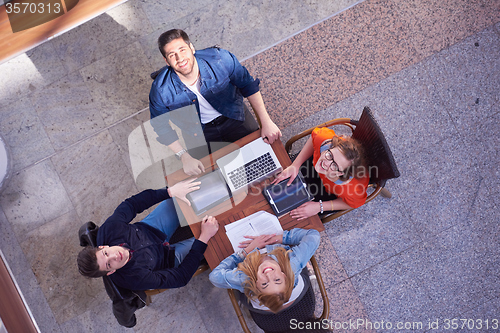 Image of students group working on school  project  together