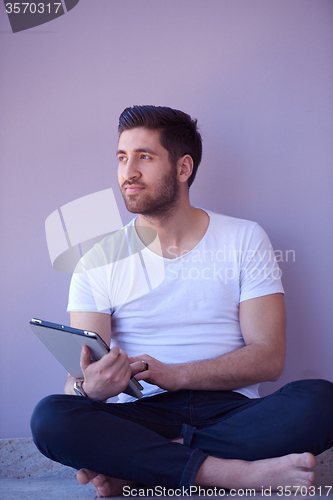 Image of student working on tablet