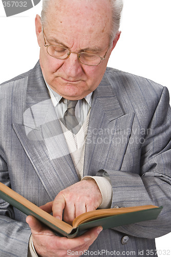 Image of Senior reading a book