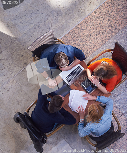 Image of students group working on school  project  together