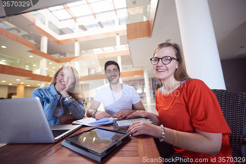 Image of students group working on school  project  together