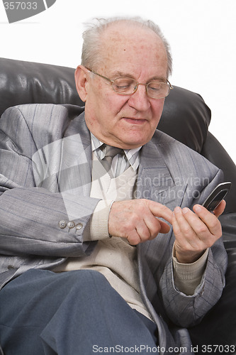 Image of Senior using a mobile phone