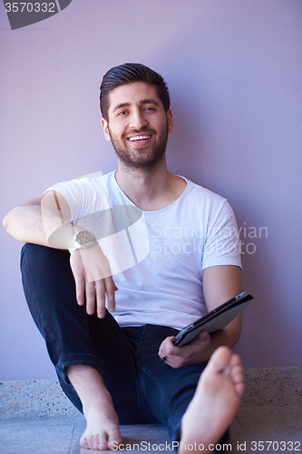Image of student working on tablet
