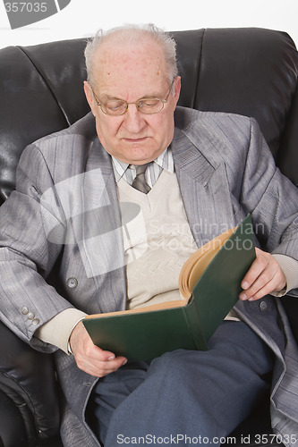 Image of Senior reading a book