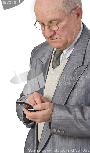 Image of Senior man using a mobile phone