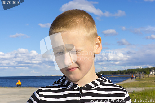 Image of Outside portrait of boy in city