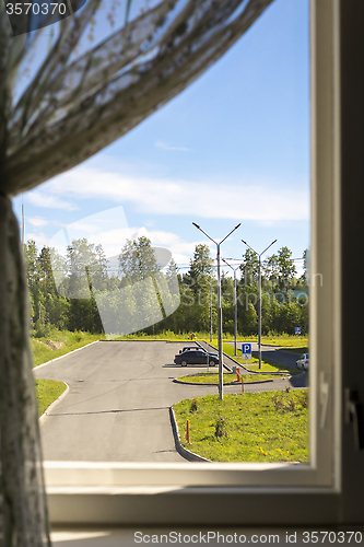 Image of Summer city in window