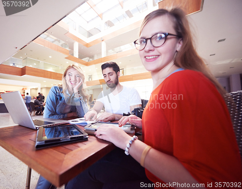 Image of students group working on school  project  together